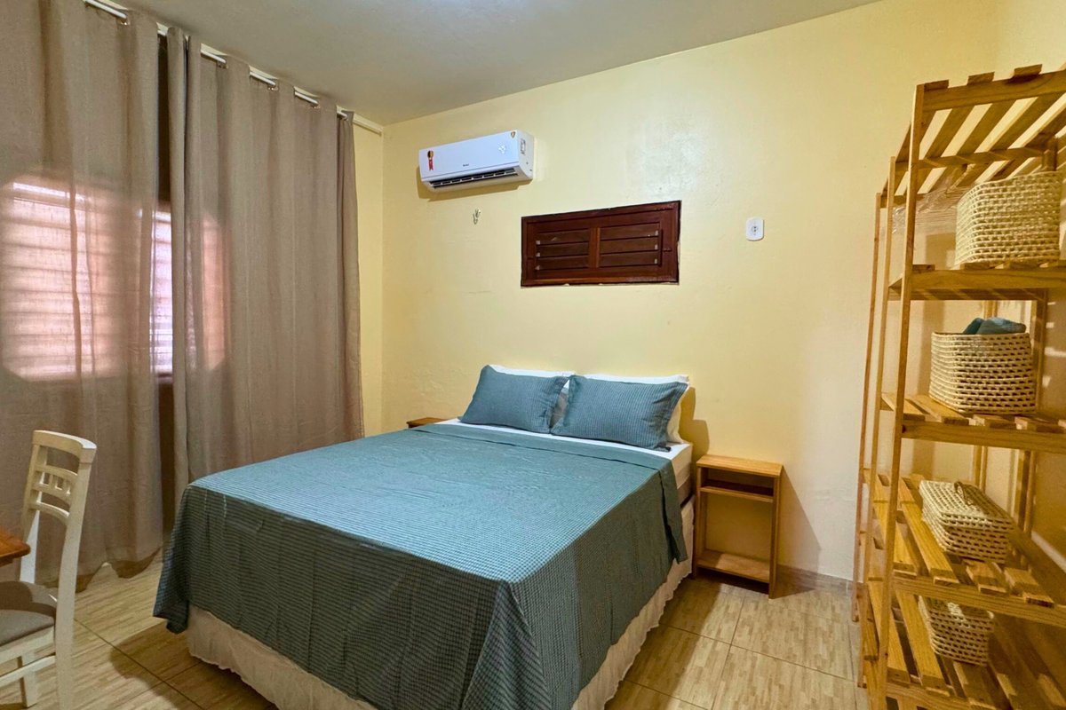 Quarto casal com ar-condicionado